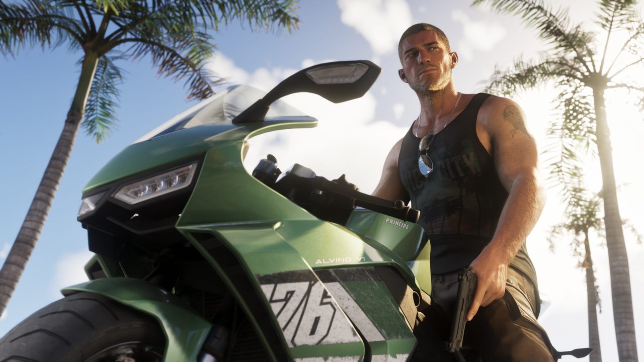 Jason Duval next to a motorcycle